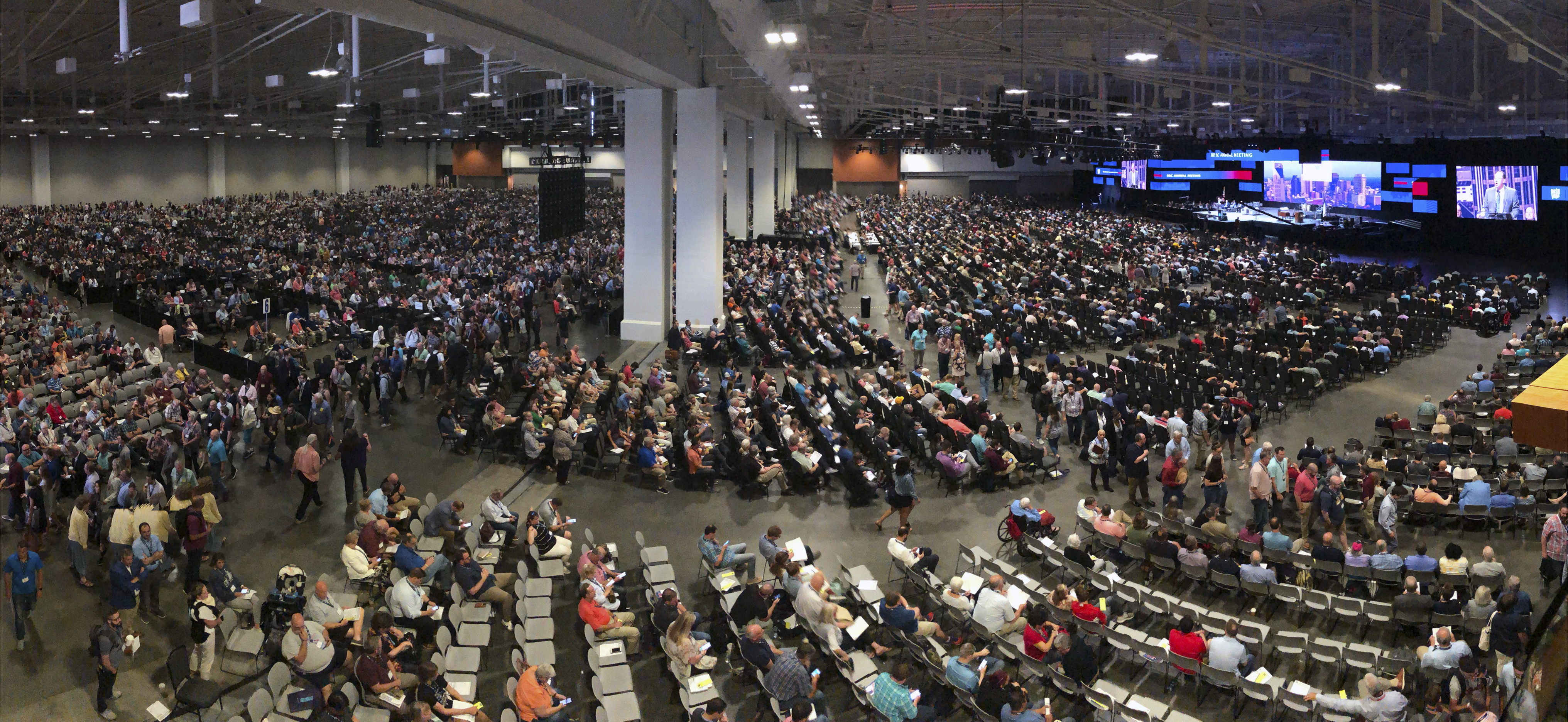 In this June 16, 2021, file photo, people attend the morning session of the Southern Baptist Convention annual meeting in Nashville, Tennessee. At that national SBC gathering in June, thousands of delegates sent the message that they did not want the Executive Committee to oversee an investigation of its own actions on how it handled sexual abuse allegations. (AP Photo/Mark Humphrey, File)