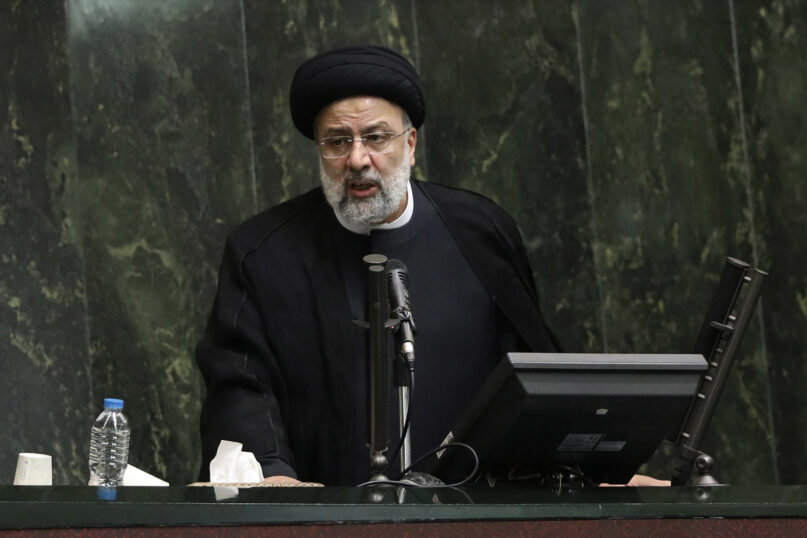 Iranian President Ebrahim Raisi at a session of parliament, in Tehran, Iran, Wednesday, Aug. 25, 2021. (AP Photo/Vahid Salemi, File)