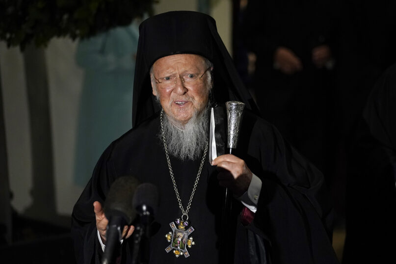 Ecumenical Patriarch Bartholomew I, the spiritual leader of the world's Eastern Orthodox Christians, talks to reporters outside the West Wing of the White House in Washington, Oct. 25, 2021, after his meeting with President Joe Biden. (AP Photo/Susan Walsh)