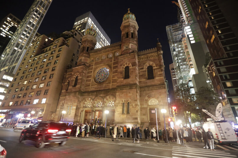 People arrive for a prayer vigil at Central Synagogue, Tuesday, Oct. 30, 2018, in New York. The vigil was held for the victims of the shooting at the Tree of Life Synagogue in Pittsburgh. (AP Photo/Frank Franklin II)