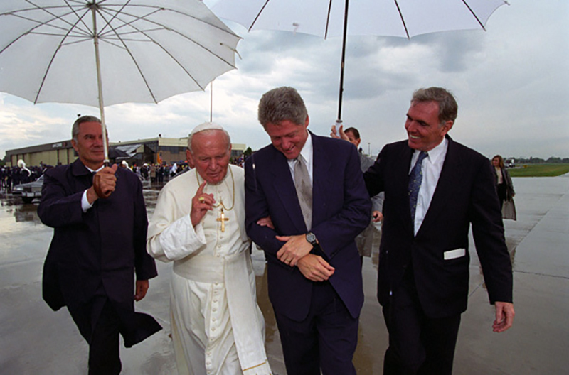 President Bill Clinton walks with Pope John Paul II on the tarmac at Stapleton International Airport in Denver, Colorado, in 1993. Photo courtesy of Creative Commons