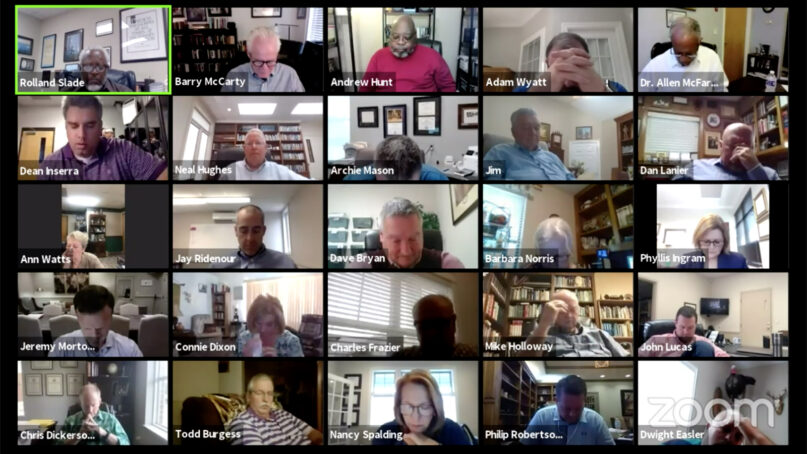 The Rev. Rolland Slade, top left, prays with attendees before a virtual special meeting of the Southern Baptist Convention Executive Committee, Oct. 5, 2021. Video screen grab