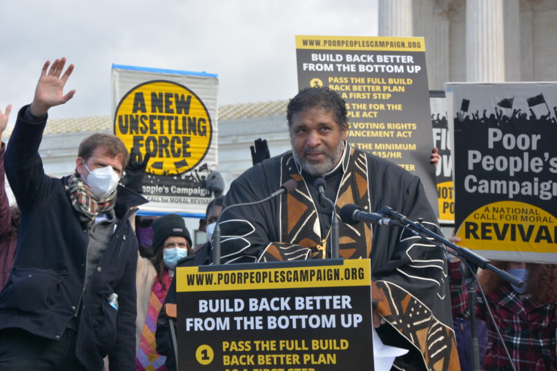 The Rev. William Barber addresses supporters with the Poor People's Campaign outside the Supreme Court on Nov. 15, 2021, in Washington. RNS photo by Jack Jenkins