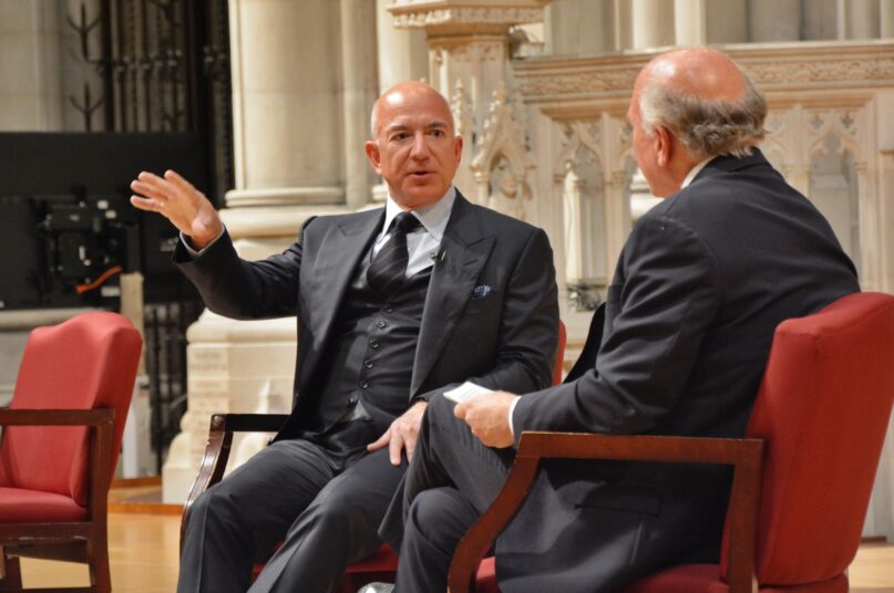 Jeff Bezos, left, speaks at Washington National Cathedral on Nov. 10, 2021. RNS photo by Jack Jenkins