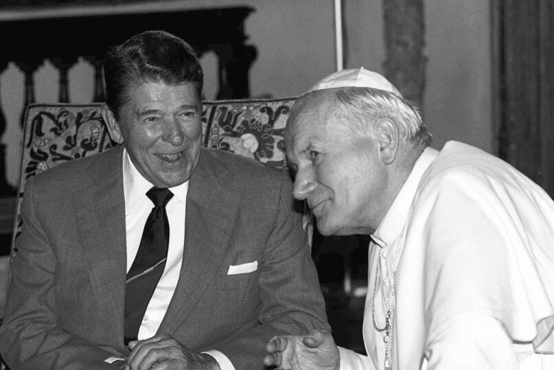 Pope John Paul II met with President Ronald Reagan in Miami in 1987. (AP Photo/Arturo Mari, File)