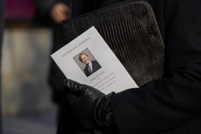 A picture of slain member of parliament David Amess at Westminster Cathedral after his funeral, in London, Tuesday, Nov. 23, 2021.(AP Photo/Alberto Pezzali)