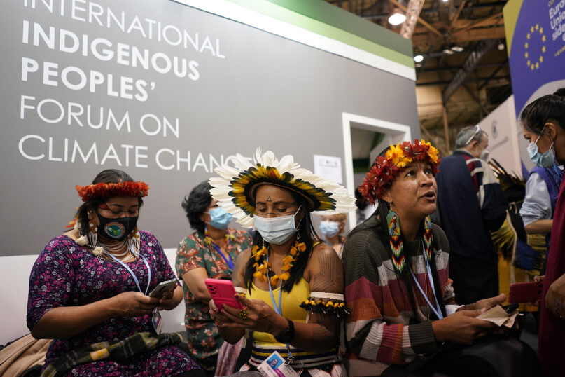 Members of the International Indigenous People’s Forum on Climate Change attend the COP26 U.N. Climate Summit, in Glasgow, Scotland, Nov. 3, 2021. The U.N. climate summit in Glasgow gathers leaders from around the world, in Scotland’s biggest city, to lay out their vision for addressing the common challenge of global warming. (AP Photo/Alberto Pezzali)