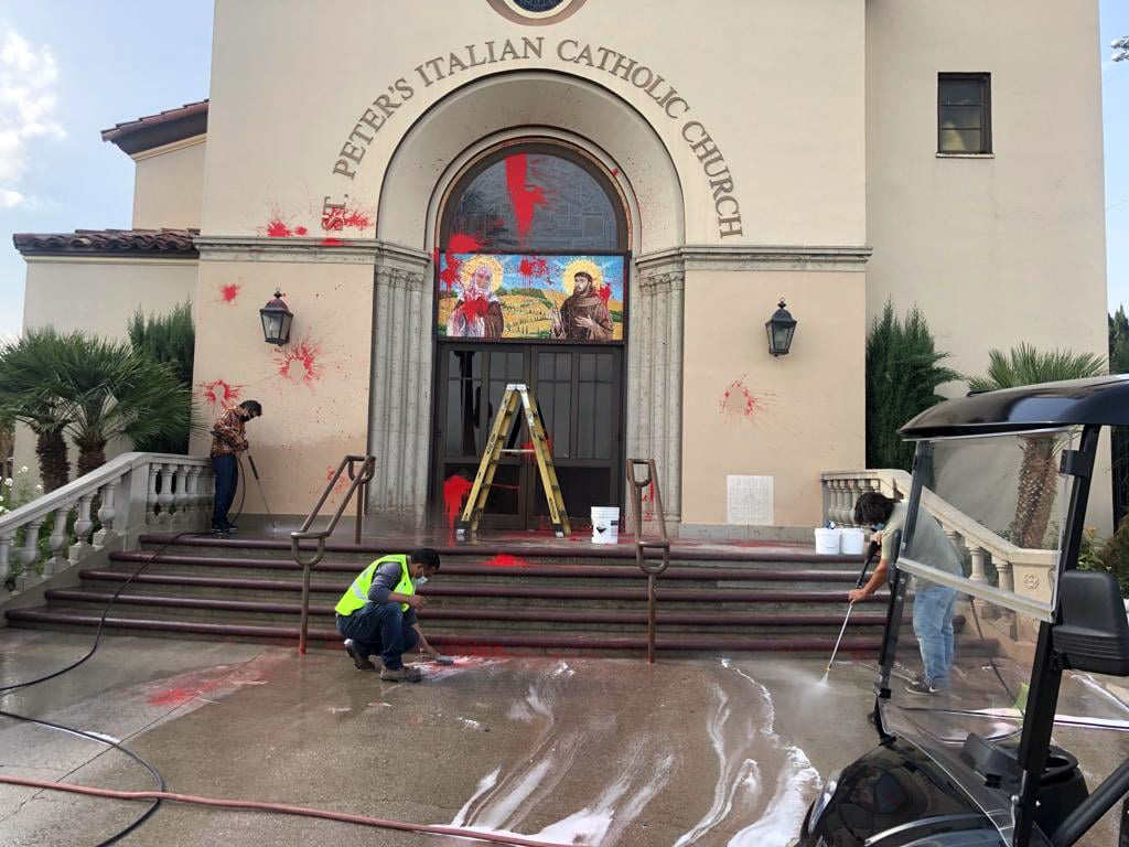 Paint and graffiti are removed after St. Peter's Italian Catholic Church was vandalized on Oct. 11, 2021, in Los Angeles. Photo by Sipriano Padilla