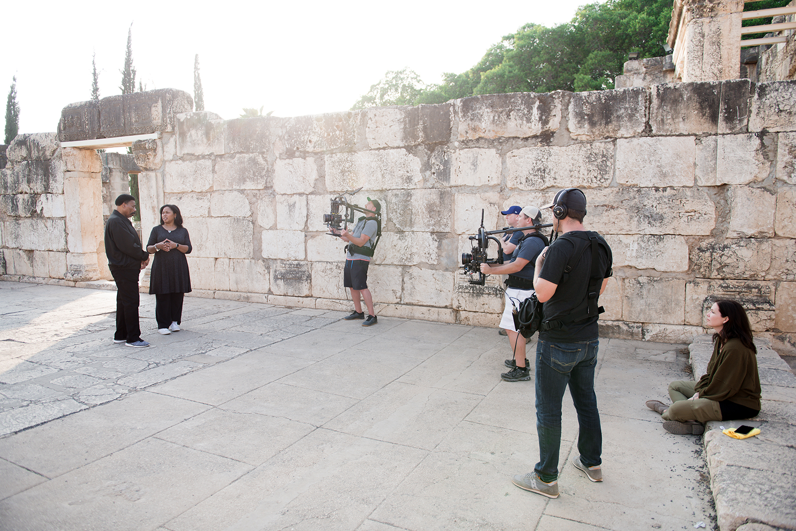 Pastor Tony Evans, left, and his daughter, Chrystal Evans Hurst, film a scene in "Journey with Jesus" during their 2018 trip to the Holy Land. Photo courtesy of Journey with Jesus