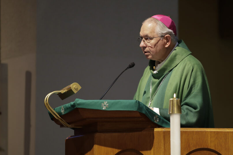 José Gómez, Archbishop of Los Angeles, leads a service at the San Gabriel Mission, Sunday, July 12, 2020, in San Gabriel, California. (AP Photo/Marcio Jose Sanchez)