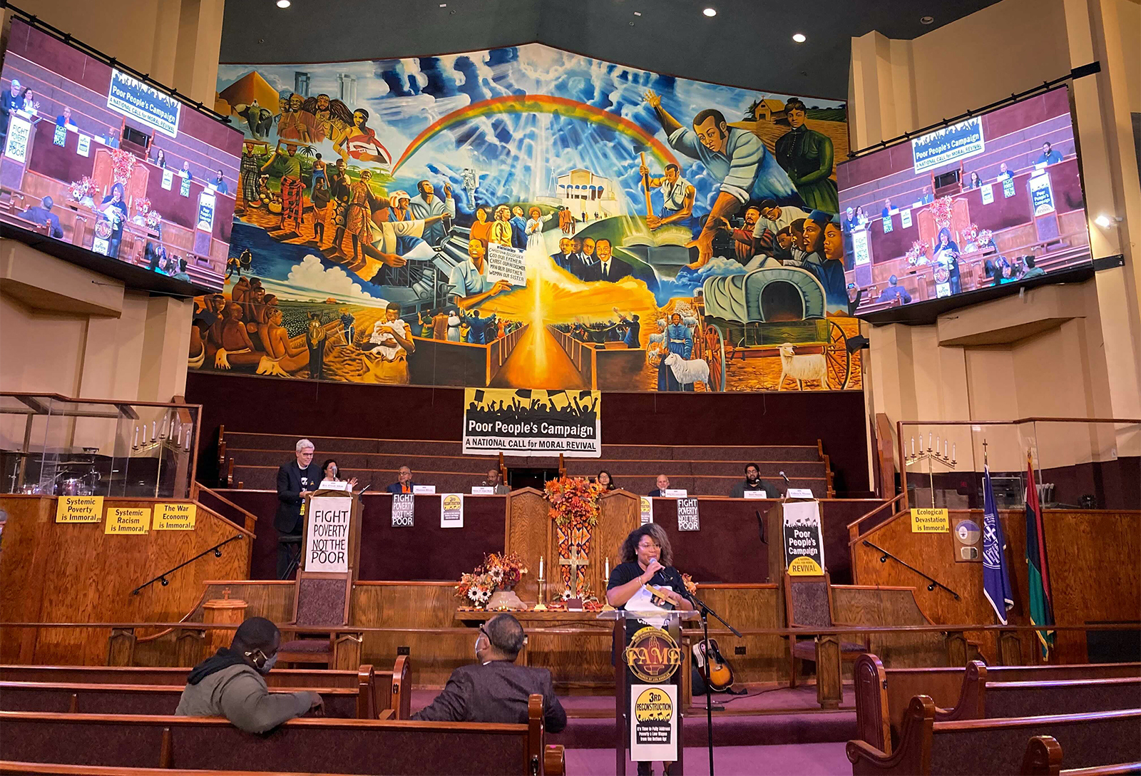Colleen Thomas, bottom center at podium, speaks during the “Constructing a Moral Narrative: Dismantling Christian Nationalism" panel at First African Methodist Episcopal Church in Los Angeles. RNS photo by Alejandra Molina