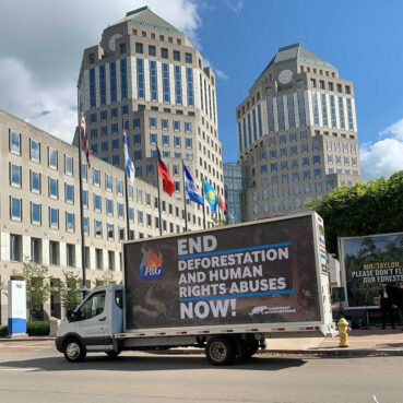 A mobile billboard is parked in front of Procter & Gamble headquarters during a demonstration in Cincinnati, Ohio. Photo courtesy of Stand.earth