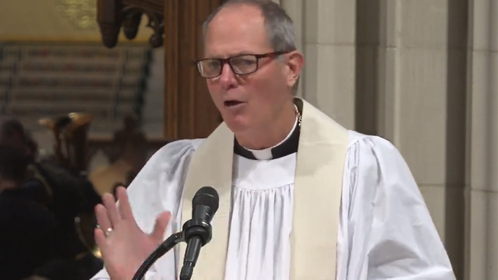 The Rev. Stuart A. Kenworthy speaks during the funeral for Colin Powell at the Washington National Cathedral, in Washington, Friday, Nov. 5, 2021. Video screengrab