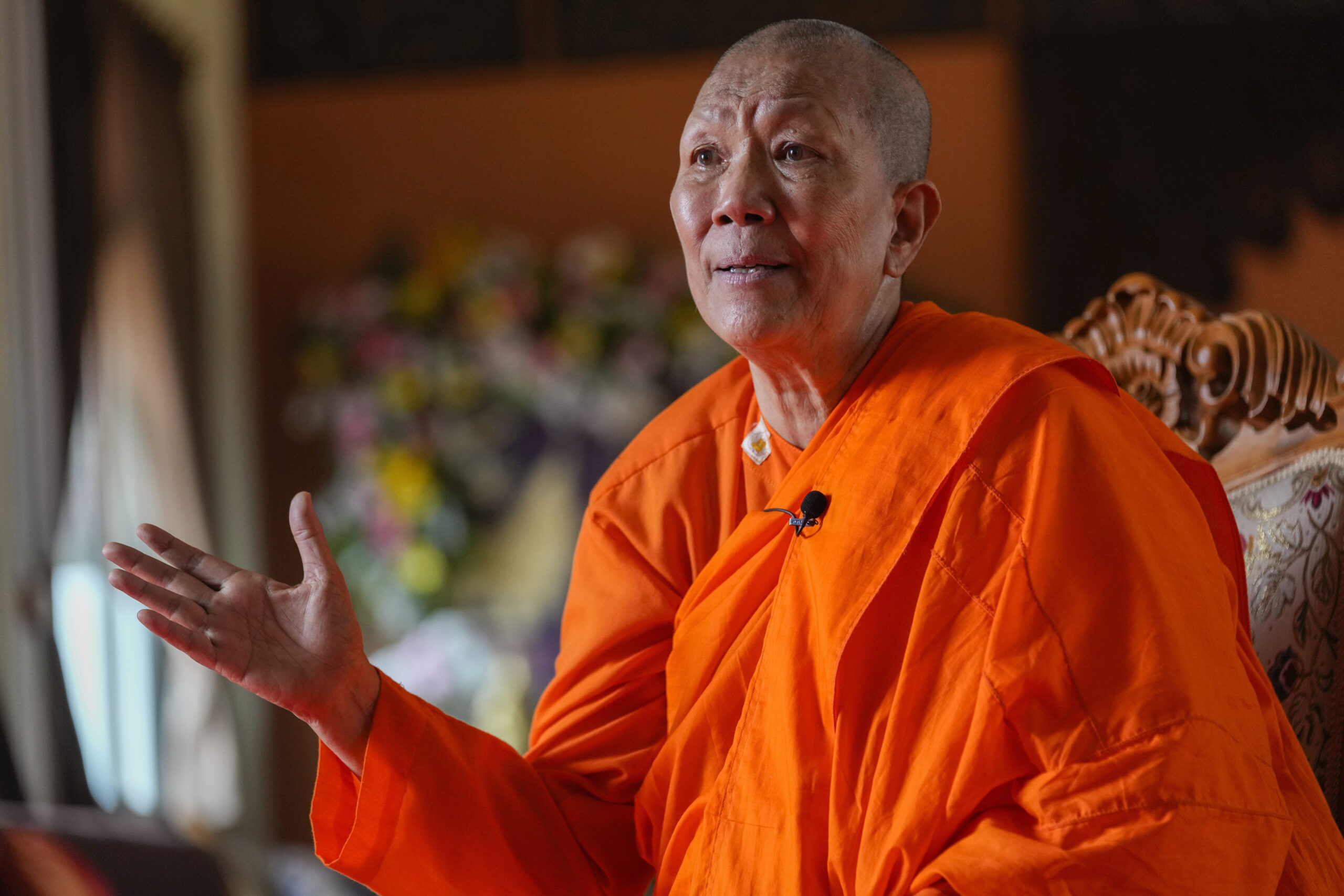 Venerable Dhammananda speaks during an interview in the Songdhammakalyani monastery, in Nakhon Pathom province on Sunday, Nov. 21, 2021. Dhammananda renounced her family life and a prestigious academic career in Thailand to follow the path of the Buddha. She then defied her homeland’s unequal status of women in Buddhist practice by traveling to Sri Lanka to become Thailand’s first fully ordained nun in Theravada, one of the oldest forms of Buddhism. (AP Photo/Sakchai Lalit