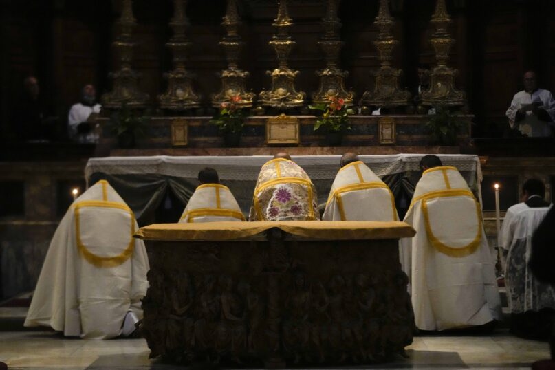 A celebrating priest leads traditional Latin vespers at Rome's ancient Pantheon basilica, in Rome, Italy, Oct. 29, 2021. Pope Francis doubled down Saturday, Dec. 18 on his efforts to quash the old Latin Mass, forbidding the celebration of some sacraments according to the ancient rite in his latest salvo against conservatives and traditionalists. (AP Photo/Luca Bruno, file)