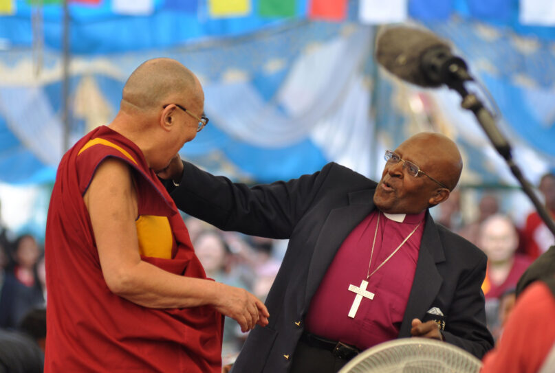 FILE - Retired South African Archbishop Desmond Tutu, right, and Tibetan spiritual leader the Dalai Lama dance at the Tibetan Children's Village school in Dharamsala, India, 23 April 2015. EPA/SANJAY BAID