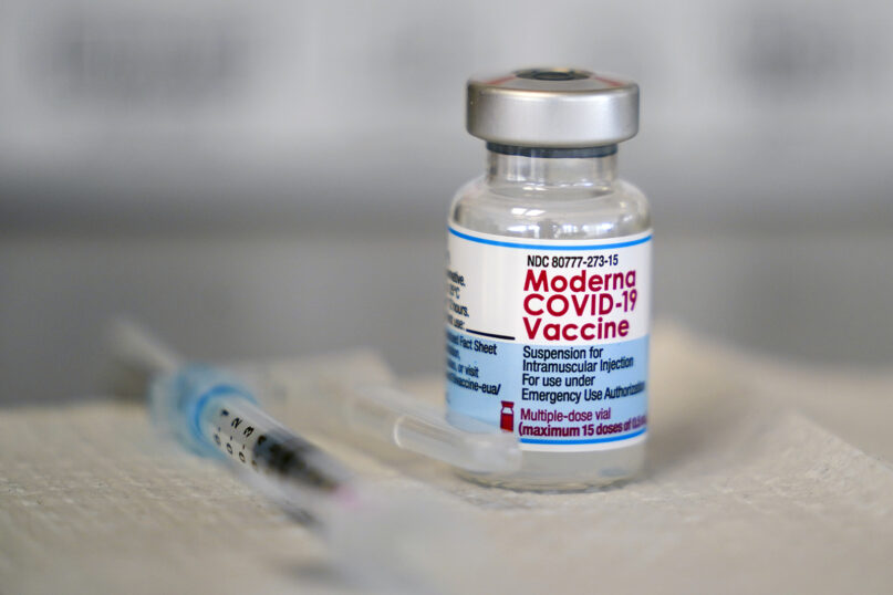 A vial of the Moderna COVID-19 vaccine is seen during a vaccination clinic at the Norristown Public Health Center in Norristown, Pa., Tuesday, Dec. 7, 2021. Moderna said Monday, Dec. 20, 2021, that a booster dose of its COVID-19 vaccine should offer protection against the rapidly spreading omicron variant. (AP Photo/Matt Rourke, File)