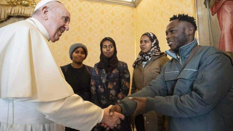 Pope Francis meets with migrants and refugees during his 85th birthday, Friday, Dec. 17, 2021, at the Vatican. Photo courtesy of Vatican Media