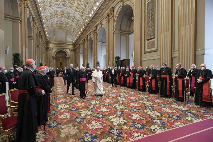 Pope Francis arrives for an audience for the annual exchange of Christmas greetings with members of the Roman Curia in the Apostolic Palace at the Vatican on Dec. 23, 2021. Photo by Vatican Media