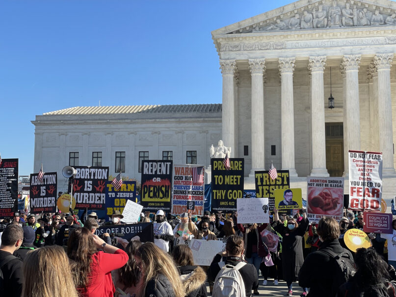 Supporters and opponents of abortion rights demonstrate outside the U.S. Supreme Court, Dec. 1, 2021, in Washington. RNS photo by Jack Jenkins