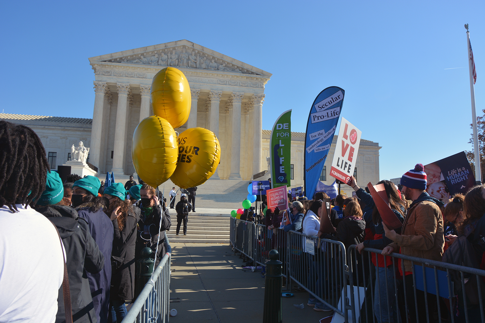 Abortion rights supporters and opponents protest outside the United States Supreme Court on Wednesday, December 1, 2021, in Washington, DC RNS photo by Jack Jenkins