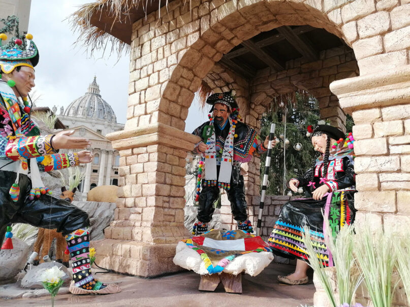 The Peruvian-themed nativity scene features bright, traditional clothing and peoples of the region. The scene reflects Peruvian culture with twists. For example, the three kings bring locally grown gifts like quinoa, corn and other Andean products. RNS photo by Claire Giangravè