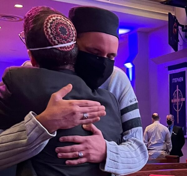 Imam Omar Suleiman hugs Rabbi Charlie Cytron-Walker after the rabbi's release from being held hostage at Congregation Beth Israel synagogue, on Saturday, Jan. 15, 2021. Photo by Asra Khan