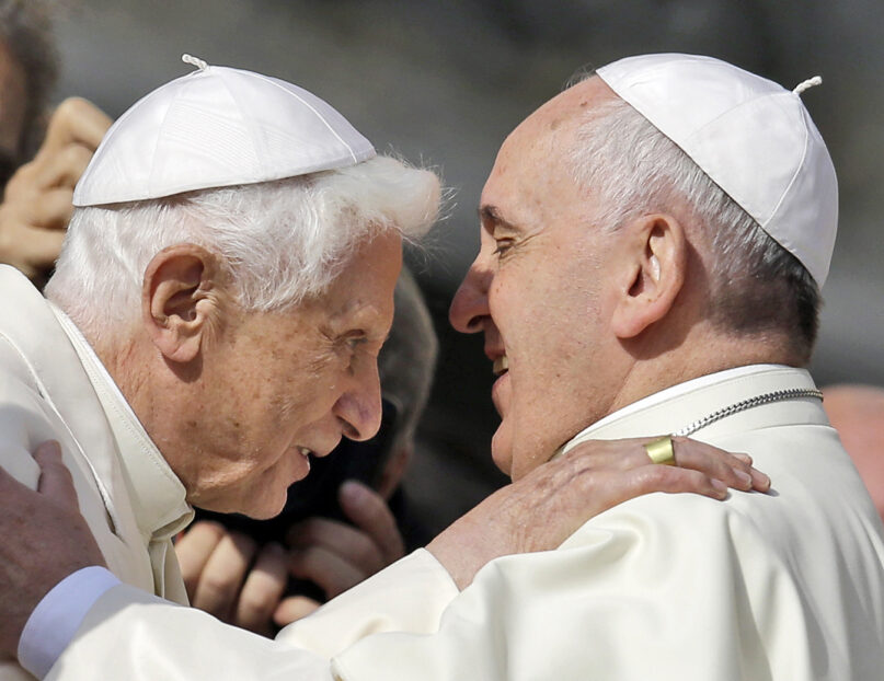 Pope Francis, right, hugs Pope Emeritus Benedict XVI prior to the start of a meeting with elderly faithful in St. Peter's Square at the Vatican, Sept. 28, 2014. A long-awaited report on sexual abuse in Germany’s Munich Diocese recently faulted  Benedict's handling of four cases when he was archbishop in the 1970s and 1980s. (AP Photo/Gregorio Borgia, File)
