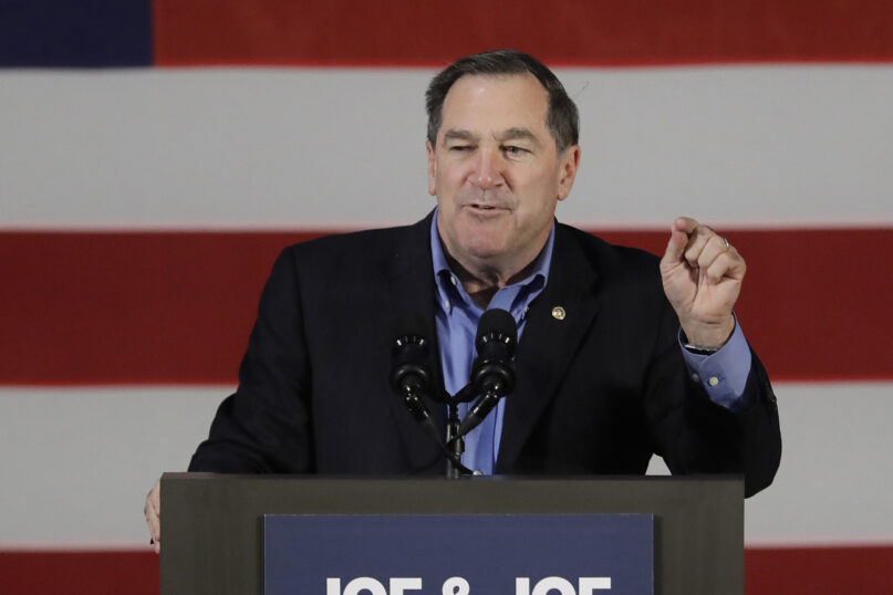 FILE- Democratic Sen. Joe Donnelly speaks during a rally, Friday, Oct. 12, 2018, in Hammond, Ind. The former Indiana senator will be heading to Rome as the U.S. ambassador to the Vatican. The U.S. Senate approved Donnelly for the position in a voice vote Thursday, Jan. 20, 2022. President Joe Biden nominated Donnelly for the ambassadorship in October. Donnelly is a Democrat who served six years in the U.S. House from a South Bend-area district before winning election to the Senate in 2012. (AP Photo/Darron Cummings_File)