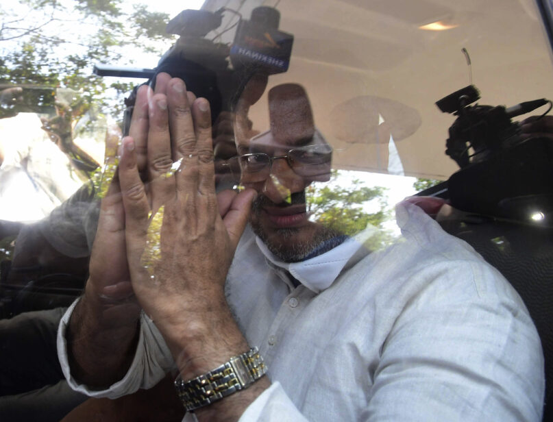 Bishop Franco Mulakkal greets the media as he leaves a court in Kottayam, India, Friday, Jan. 14, 2022. An Indian court acquitted the Roman Catholic bishop of charges of raping a nun in her rural convent, a case that became a major issue of allegations of sexual harassment in the church. Sessions Judge G. Gopakumar in a brief order said the bishop was not guilty of charges that he repeatedly raped the nun between 2014 and 2016. (AP Photo)