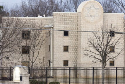 The Congregation Beth Israel synagogue is shown, Sunday, Jan. 16, 2022, in Colleyville, Texas. A man held hostages for more than 10 hours Saturday inside the temple. The hostages were able to escape and the hostage taker was killed. FBI Special Agent in Charge Matt DeSarno said a team would investigate "the shooting incident." (AP Photo/Brandon Wade)