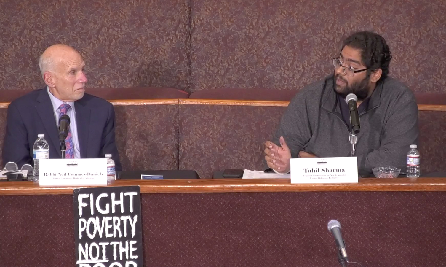 Rabbi Neil Comess-Daniels, left, and Tahil Sharma participate in the “Constructing a Moral Narrative: Dismantling Christian Nationalism" panel at First African Methodist Episcopal Church in Los Angeles, Thursday, Nov. 18, 2021. Video screengrab