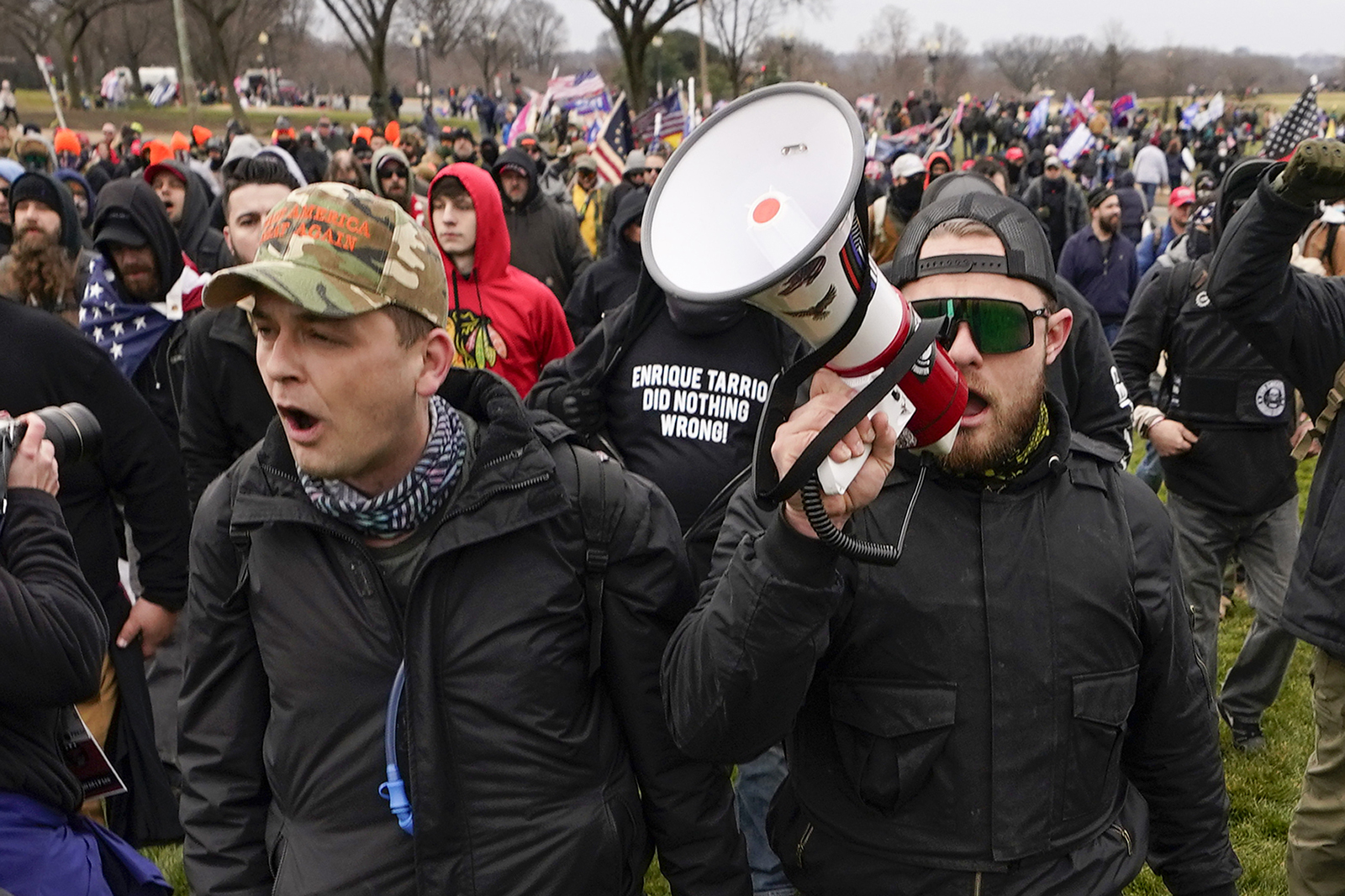 FILE - Proud Boys members Zachary Rehl, left, and Ethan Nordean, left, walk toward the U.S. Capitol in Washington, in support of President Donald Trump on Jan. 6, 2021. A federal judge on Tuesday, Dec. 28 refused to dismiss an indictment charging four alleged leaders of the far-right Proud Boys, Ethan Nordean, Joseph Biggs, Zachary Rehl and Charles Donohoe, with conspiring to attack the U.S. Capitol to stop Congress from certifying President Joe Biden's electoral victory. (AP Photo/Carolyn Kaster, File)