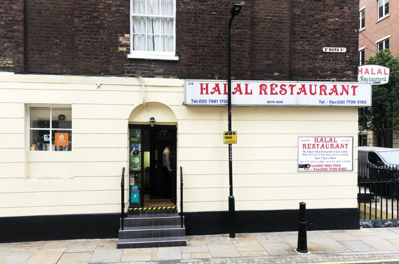 Halal Restaurant was founded in 1939 to serve Muslim maritime workers and has shifted with the times to continue serving East London. RNS photo by Joseph Hammond