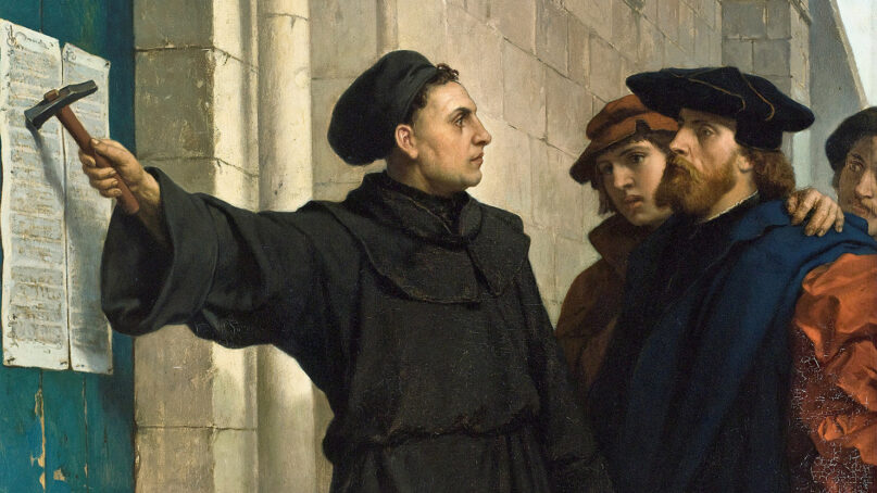 Martin Luther posting his 95 theses in 1517, painted by Ferdinand Pauwels in 1872. Image via Wikimedia/Creative Commons