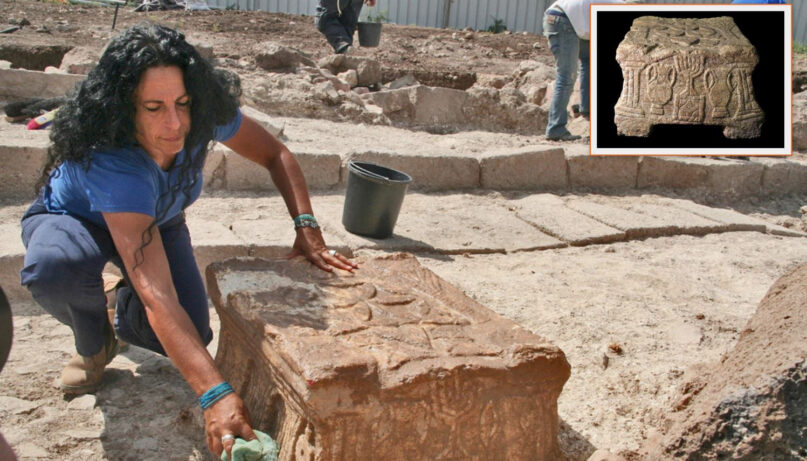 Archaeologist Dina Avshalom-Gorni works at a synagogue uncovered in Migdal, Israel, in 2009. The synagogue contained a stone embossed with the image of a seven-branched menorah. Photo courtesy of University of Haifa and Yoli Schwartz / Israel Antiquities Authority