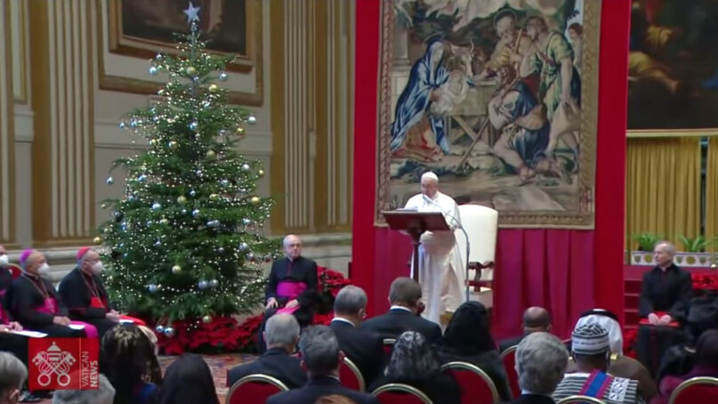 Pope Francis addresses members of the diplomatic corps accredited to the Holy See in the Hall of Blessing of the Apostolic Palace, in the Vatican, Monday, Jan. 10, 2022. Video screengrab via Vatican News