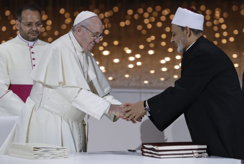 Pope Francis greets Sheikh Ahmad al-Tayyeb, the grand imam of Egypt's Al-Azhar, after an Interreligious meeting at the Founder's Memorial in Abu Dhabi, United Arab Emirates, on Feb. 4, 2019. The Vatican released a statement from President Joe Biden marking the International Day of Human Fraternity, a U.N.-designated celebration of interfaith and multicultural understanding inspired by a landmark document signed on Feb. 4, 2019 in Abu Dhabi by Francis and Sheikh Ahmad al-Tayyeb, the imam of the Al-Azhar center for Sunni learning in Cairo. (AP Photo/Andrew Medichini)