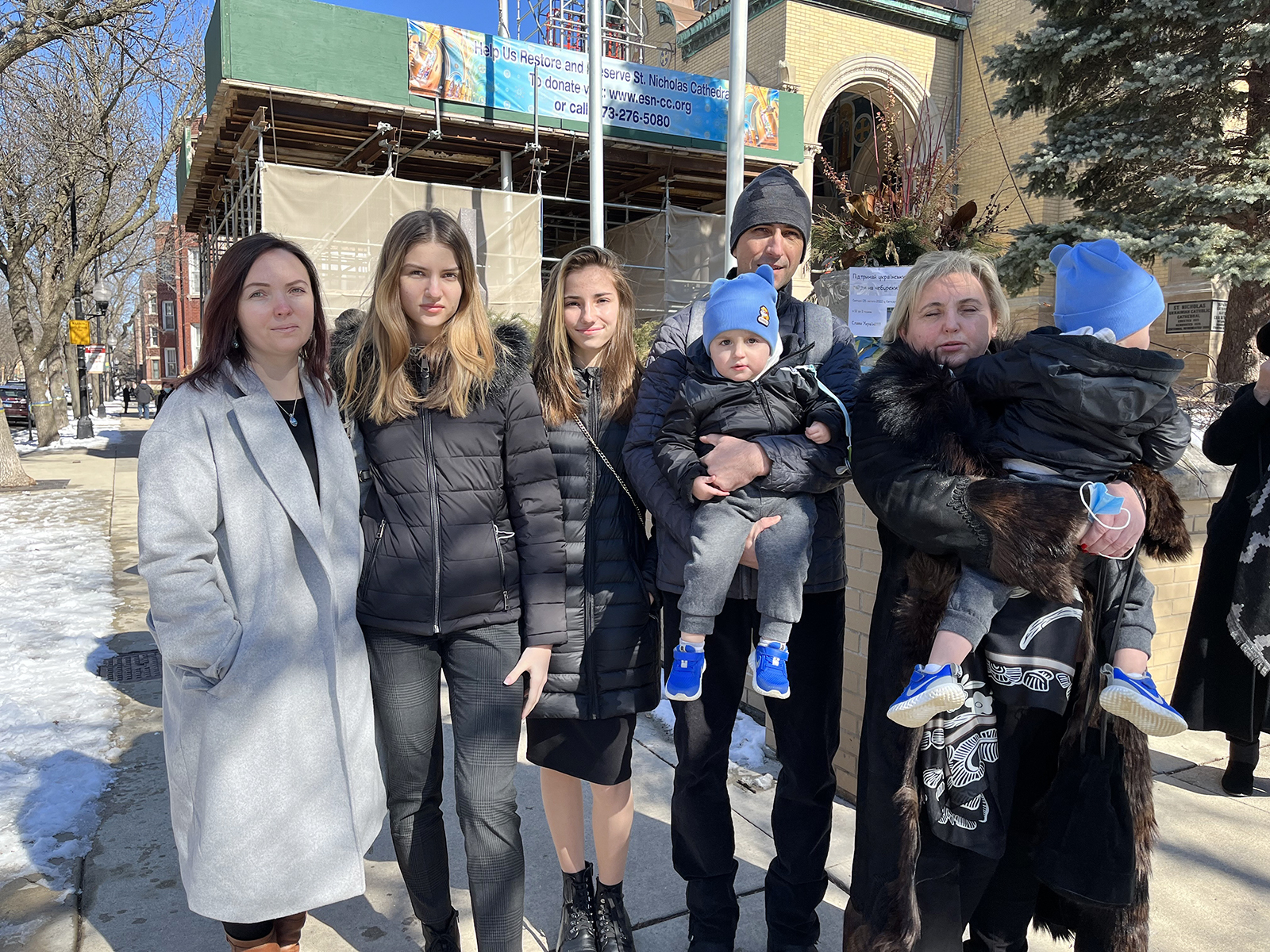 Tamara Nosa, far left, and her family outside St. Nicholas Ukrainian Catholic Cathedral, Sunday, Feb. 27, 2021, in Chicago. RNS photo by Emily McFarlan Miller