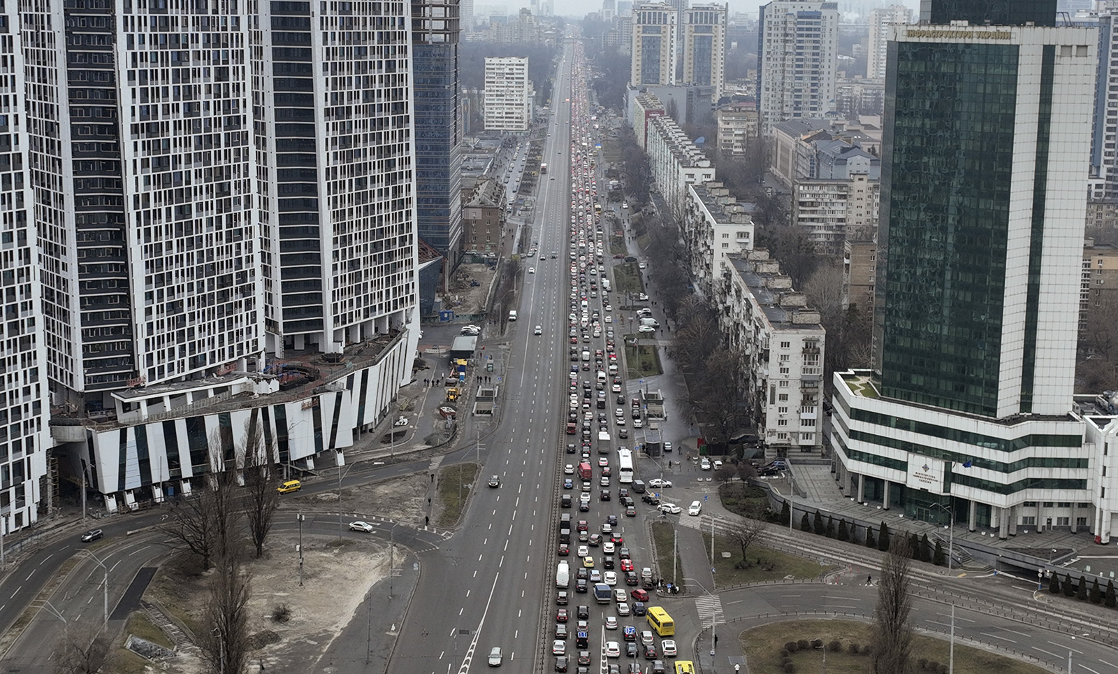 Traffic jams are seen as people leave the city of kyiv, Ukraine, February 24, 2022. (AP Photo/Emilio Morenatti)