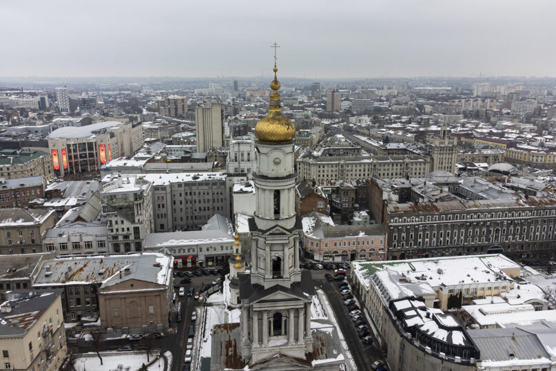The Assumption or Dormition Cathedral, the main Orthodox church of Kharkiv, rises above the center of Kharkiv, Ukraine's second-largest city, Feb. 4, 2022. (AP Photo/Evgeniy Maloletka)