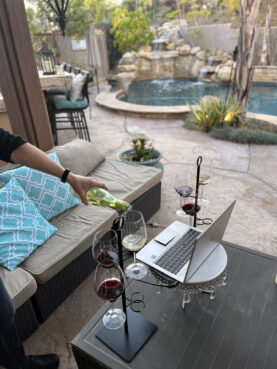 Wines are poured at Steve Inrig's home in southern California in preparation for wine church. Courtesy photo