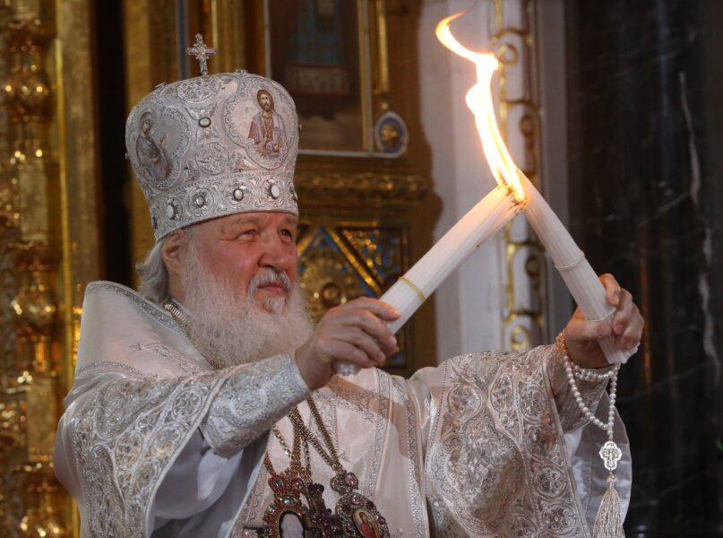 Russian Orthodox Patriarch Kirill lights candles during the Orthodox Easter service in Moscow. (Mikhail Svetlov/Getty Images)