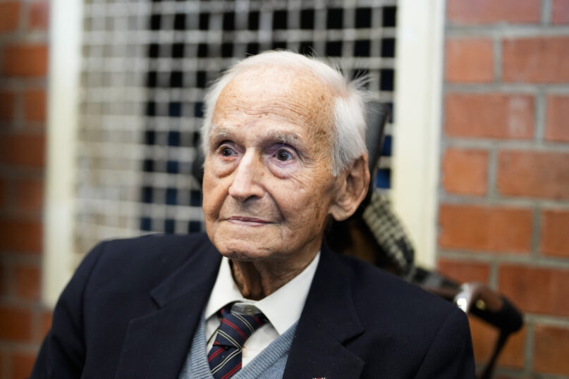 FILE - Leon Schwarzbaum poses for a photo in his home during an interview with the Associated Press in Berlin, Dec. 12, 2019. Schwarzbaum, holocaust survivor of the Nazis’ death camp at Auschwitz and lifelong fighter for justice for the victims of the Holocaust, has died. He was 101. Schwarzbaum died early Monday in Potsdam near Berlin. (AP Photo/Markus Schreiber, File)