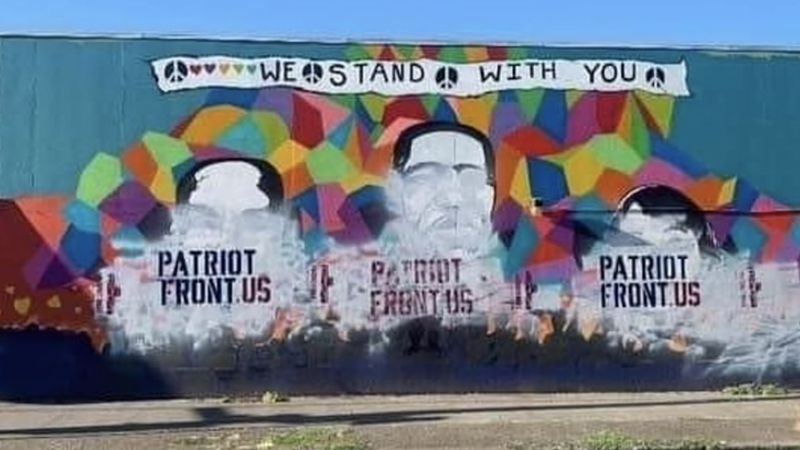 A mural by Firekat honoring George Floyd, Breonna Taylor and Ahmaud Arbery was vandalized with white supremacist graffiti in Portland, Oregon, in July 2021. Photo via Instagram/Firekatg
