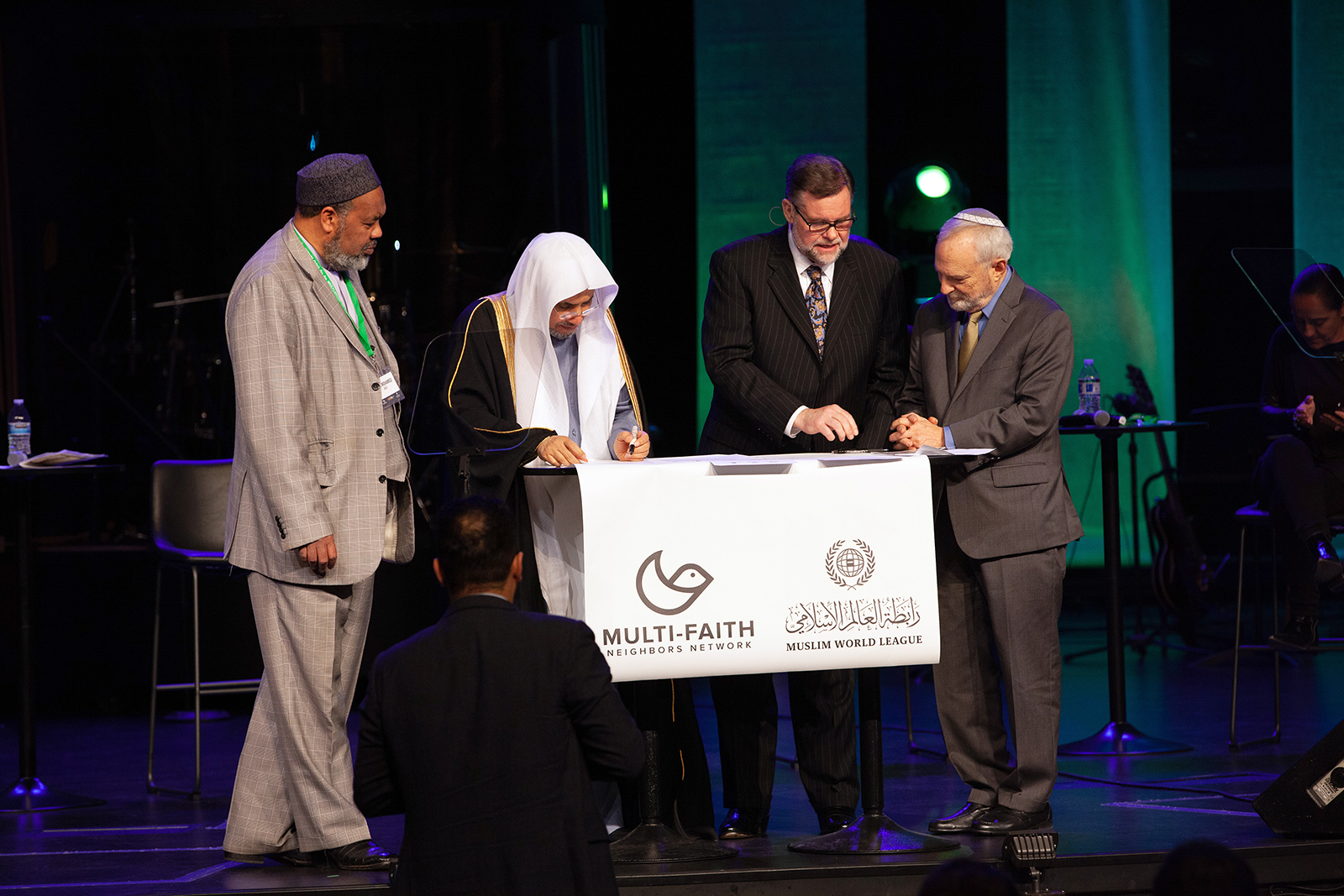 Imam Mohammed Magid, from left, Mohammad Al-Issa, Pastor Bob Roberts Jr. and Rabbi David Saperstein, all of the Multi-Faith Neighbors Network, at the Global Faith Forum at Northwood Church in Keller, Texas, March 6, 2022. (Photo courtesy of MFNN)