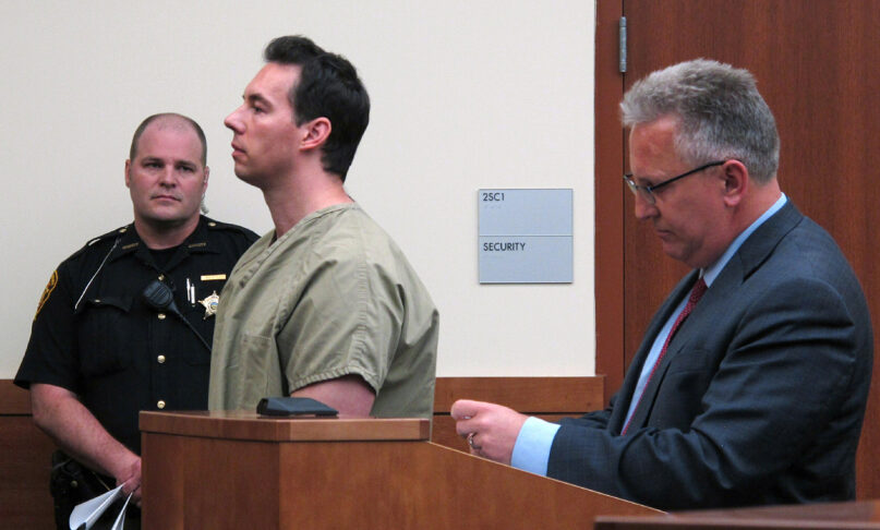 FILE - In this June 5, 2019, file photo, former critical care doctor William Husel, center, pleads not guilty to murder charges while appearing with defense attorney Richard Blake, right, in Franklin County Court in Columbus, Ohio. (AP Photo/Kantele Franko, File)
