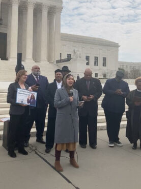 Maggie Siddiqi speaks during a rally in support for Judge Ketanji Brown Jackson, Wednesday, March 30, 2022, in front of the Supreme Court. Video screen grab