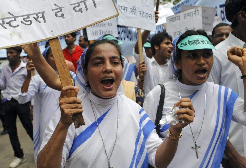 Nuns from a group of Dalit Christians, or India's lowest caste who converted to Christianity, protest in New Delhi. (AP Photo/Gurinder Osan)