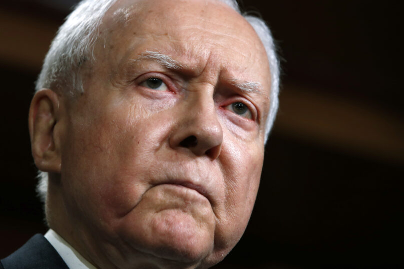 FILE - Sen. Orrin Hatch, R-Utah, attends a news conference with Republican members of the Senate Judiciary Committee on Capitol Hill in Washington on Oct. 4, 2018. A longtime senator known for working across party lines, Hatch died Saturday, April 23, 2022, at age 88. (AP Photo/Jacquelyn Martin, File)